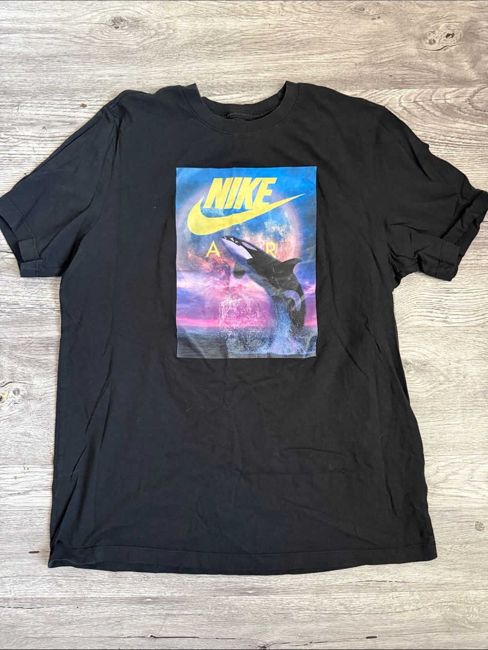 Nike Black Short-Sleeve Tee with Yellow Logo and Multicolor Whale Graphic